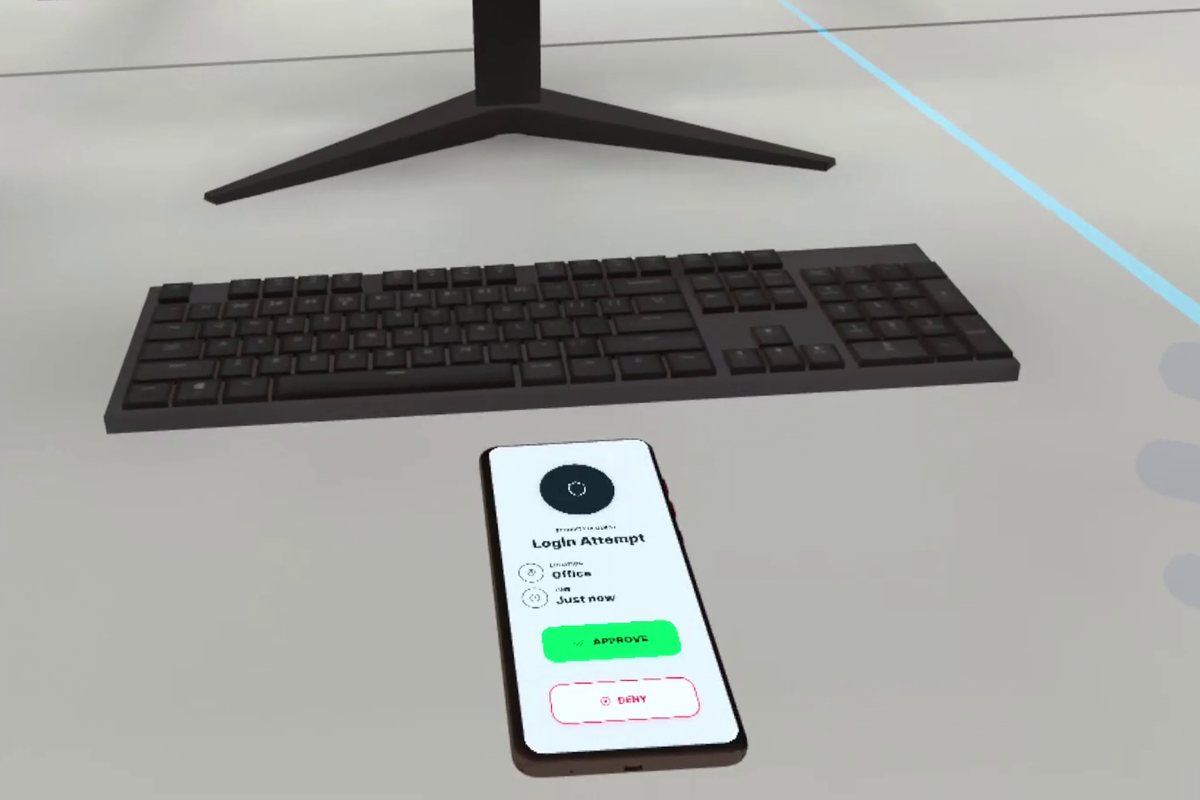 Smartphone auf einem Schreibtisch mit einer Anmeldeanfrage fuer die Zwei-Faktor-Authentifizierung im VR-Training